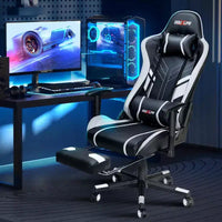 Douxlife Fauteuil de Jeu Ergonomique Moderne avec Massage à 7 Points, Repose-Pieds et Accoudoirs Réglables Noir et Blanc