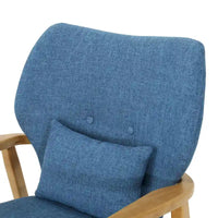 Fauteuil à bascule en bois massif avec coussin en lin et fabrication artisanale haut de gamme