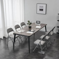 Chaises pliantes élégantes en fer et PVC pour conventions et expositions Blanches