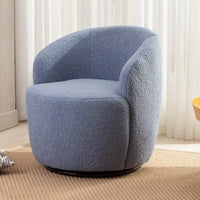 Fauteuil pivotant en tissu bouclette avec anneau en métal thermolaqué