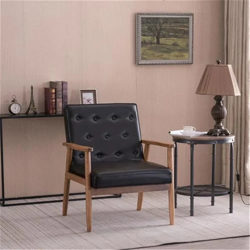 Chaise rétro moderne en similicuir noir
