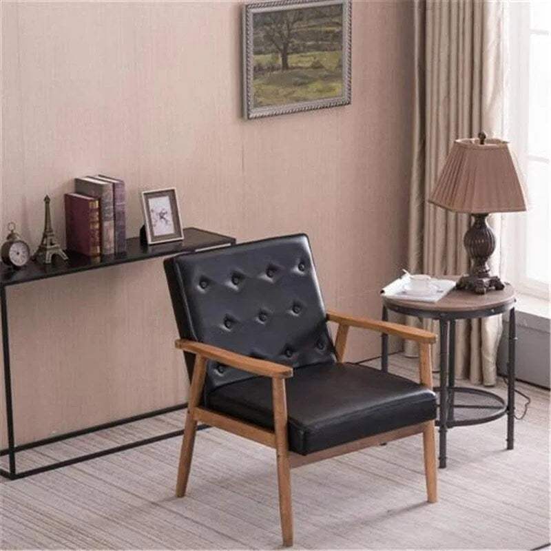 Chaise rétro moderne en similicuir noir