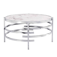 Table basse moderne avec plateau en pierre frittée et cadre métallique robuste