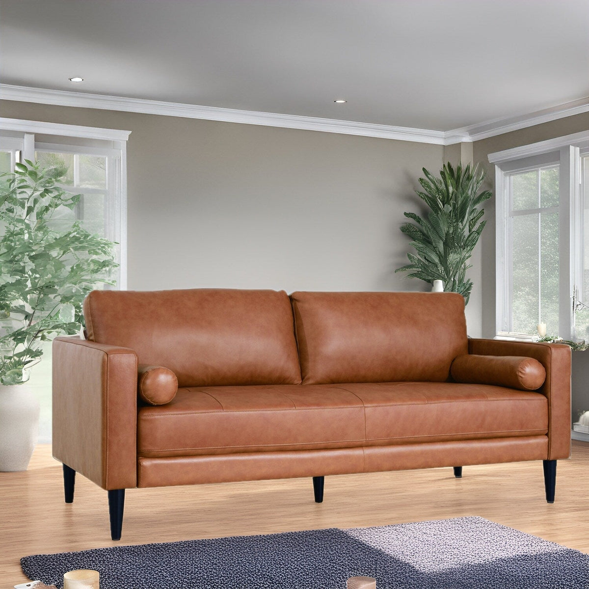Canapé moderne en cuir véritable avec pieds en bois & coussin traversin supplémentaire