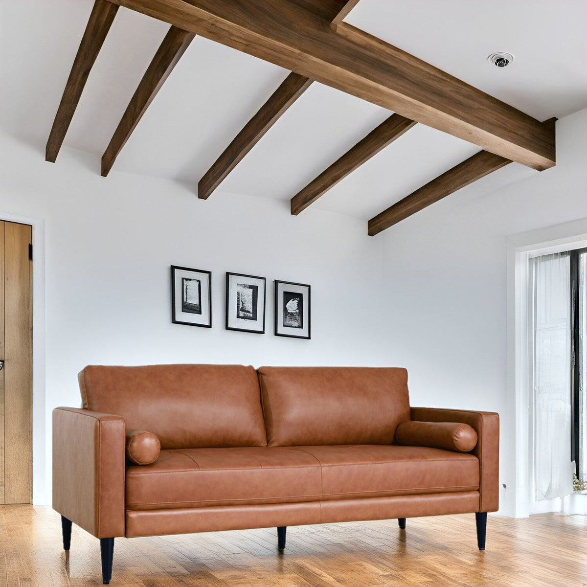 Canapé moderne en cuir véritable avec pieds en bois & coussin traversin supplémentaire