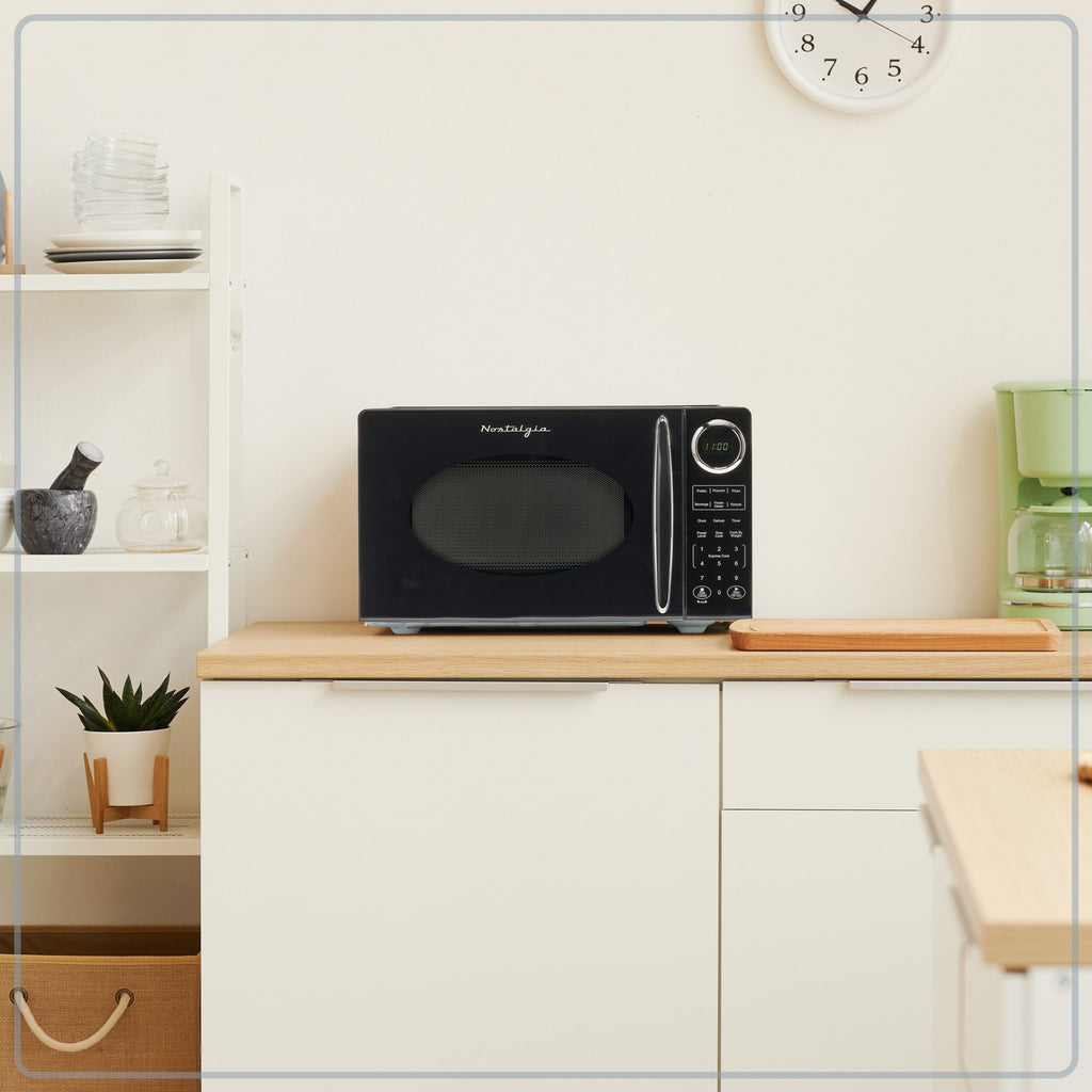 Nostalgia Retro Four micro-ondes de comptoir 0.9 pied cube